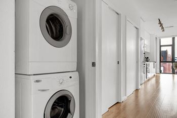 a front loading washer and dryer in a laundry room at The Shay, Washington, DC